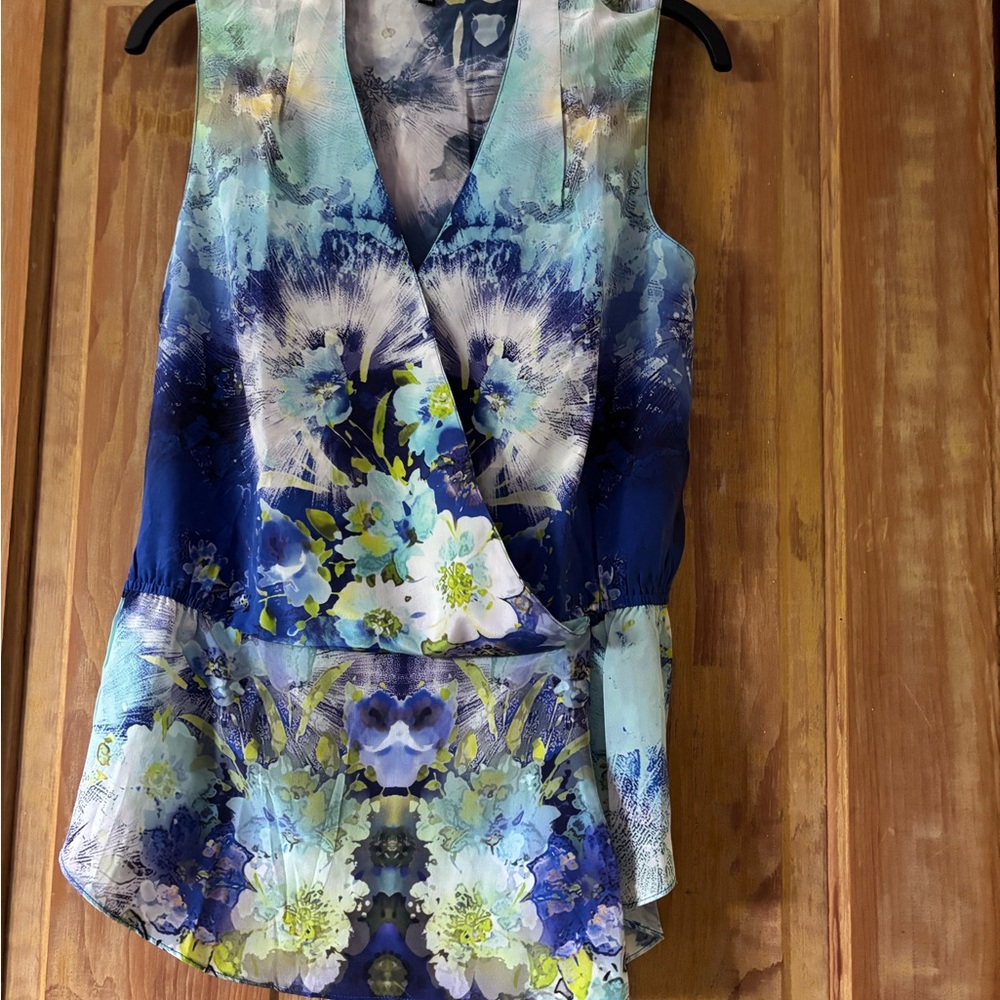 ANTONIO MELANI Blue Floral Sleeveless Wrap Look Peplum Blouse